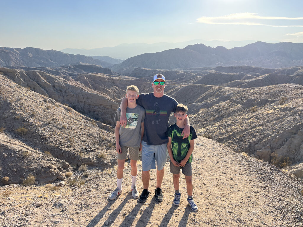 Van Voyage owner and kids on Painted Canyon van rental trip