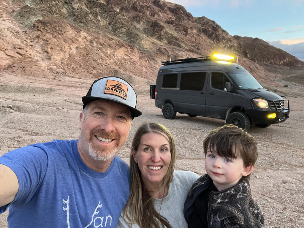 Family photo in front of new van at Death Valley National Park